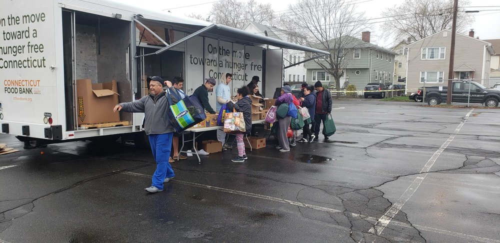 Attendees visit the Connecticut Food Bank truck. (Photo: Ross Lager)