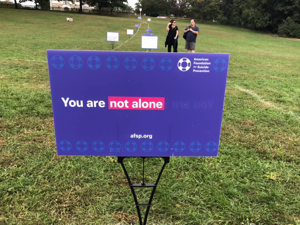 Signs at the Out of the Darkness walk in Hamden, Conn.