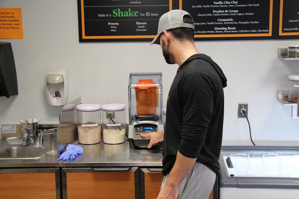 AJ Cooney blending a Cinnabunn Smoothie | Photo by Pat Hickey