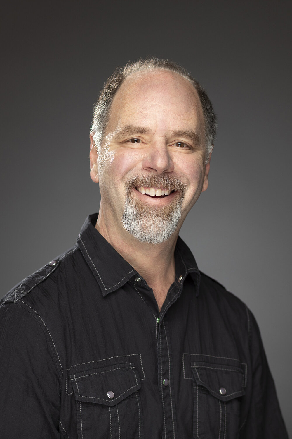 Quinnipiac University film professor, David Atkins’ professional headshot.