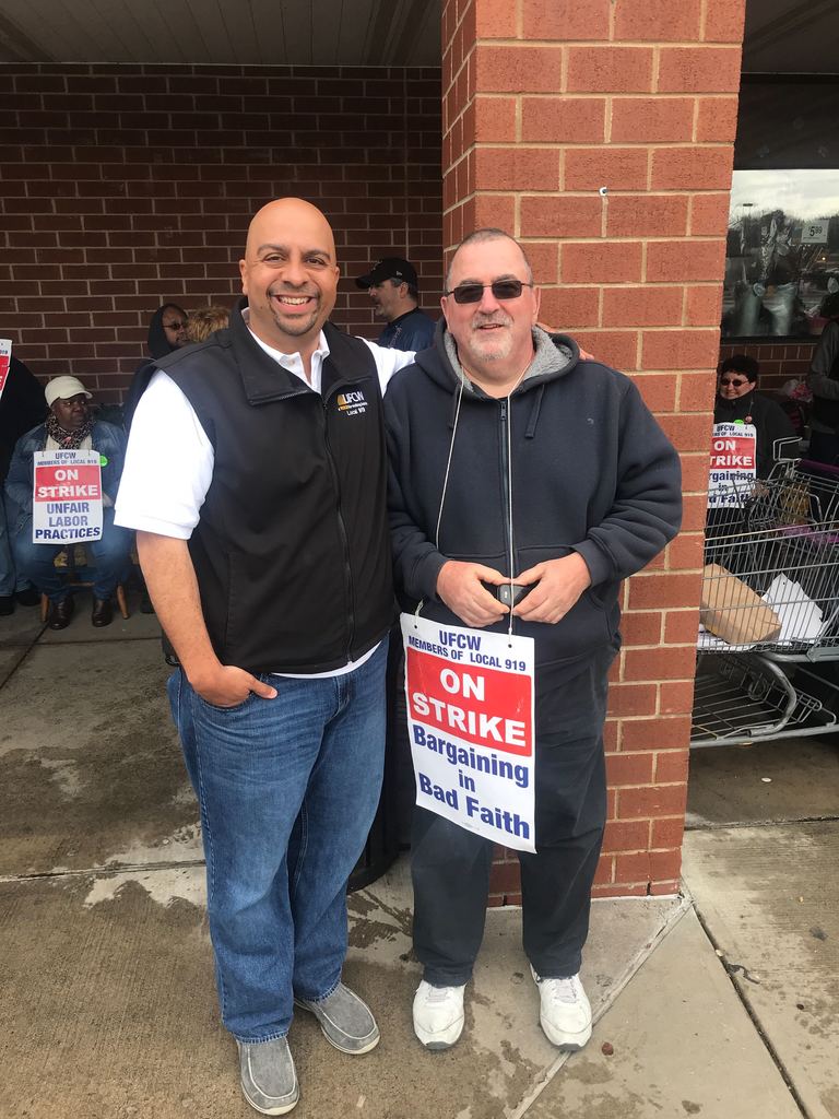 Jorge Cabrera (Left) and Joe Renaldi (Right) pose for a picture in front of the Hamden Stop &amp; Shop location.