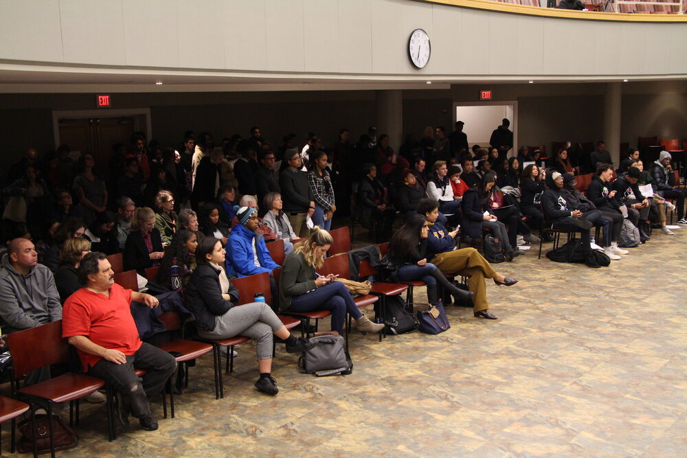 The crowd that showed up to the commission meeting. Center of the aisle, people are lined up to voice their concerns with the commission. Photo by Bryan Proctor.