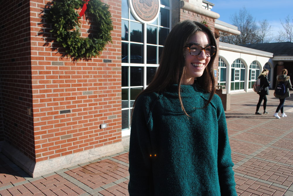 Senior health science major Danielle Rattotti outside of the library.