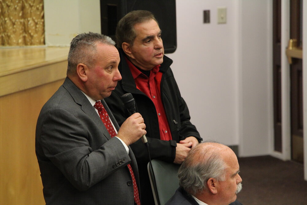 Acting Chief of Hamden Police, John Cappiello, answering Kerry Ellington’s questions about a timeline for Eaton’s case. Photo by Bryan Proctor.