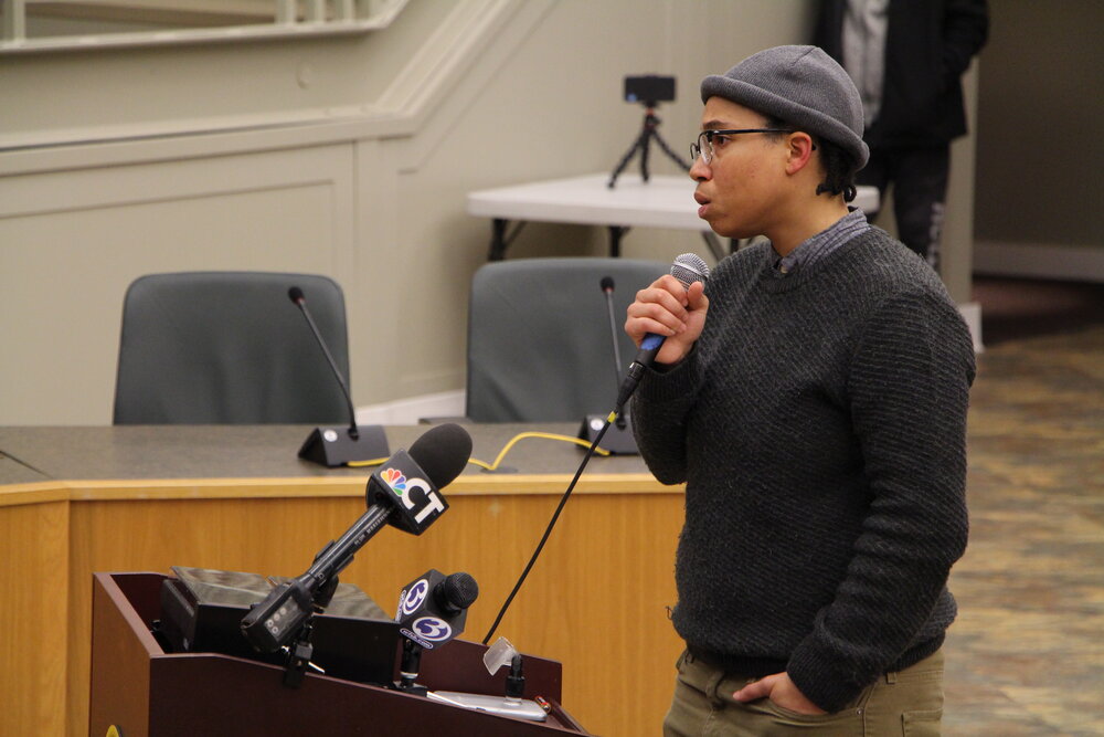 Kerry Ellington offered her concerns about policing in Hamden and the case of police officer Devin Eaton to the Hamden Police Commission. Photo by Bryan Proctor.