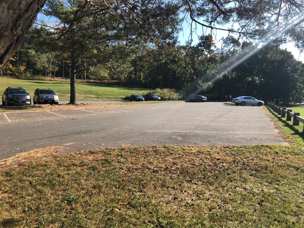 The parking lot of Sleeping Giant State Park was nearly empty on a sunny and warm Wednesday morning.