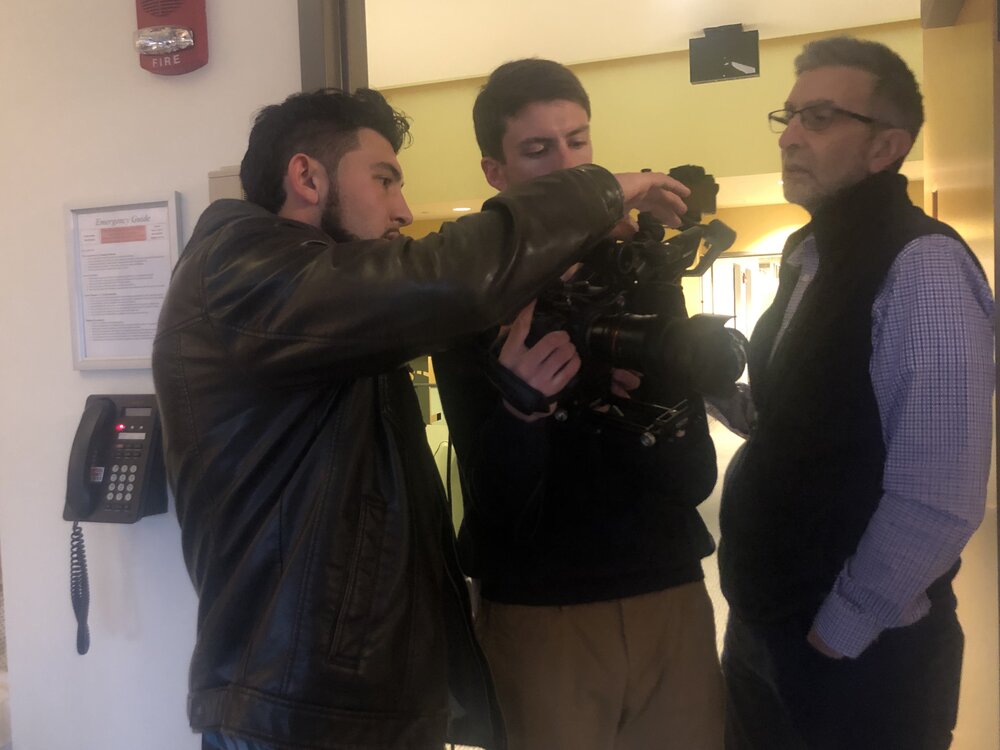 Joe Marcello directing his independent student film “Denver to Boston” at Quinnipiac University’s North Haven campus on Dec. 13, 2019. Pictured left to right: Joe Marcello (director), Matthew Allen (director of photography), Phillip Simon (Professor).