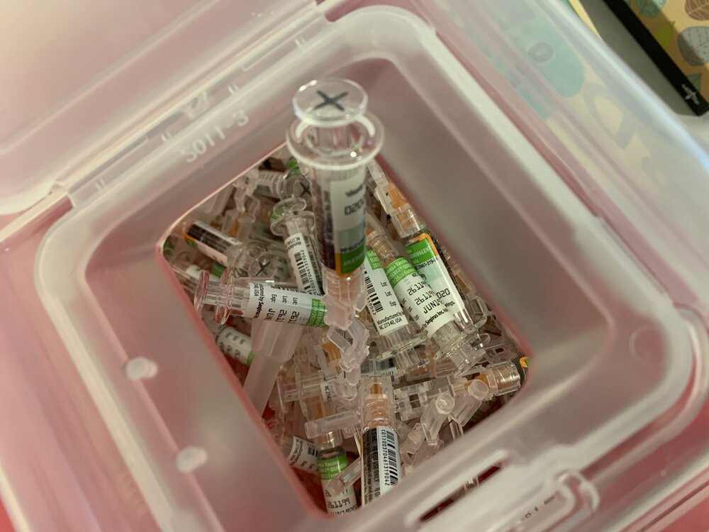 Used vaccination containers used throughout the day at Quinnipiac.  Photo: Leah Sutherland