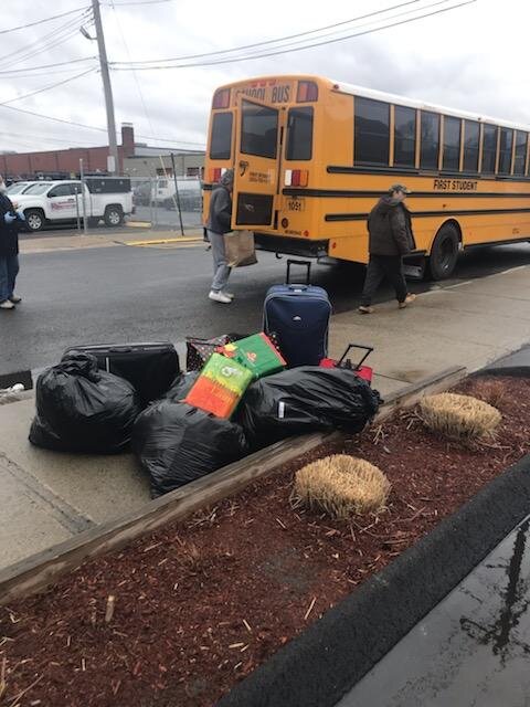 Columbus House utilized school buses to transport shelter clients to nearby hotels. Courtesy: Columbus House