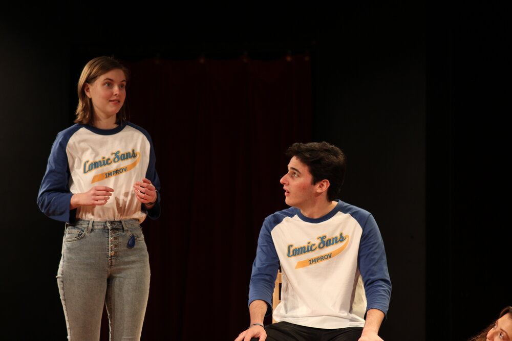 Sarah Fisher expresses ideas to Kevin Cathy, both members of Quinnipiac’s Improv troupe.