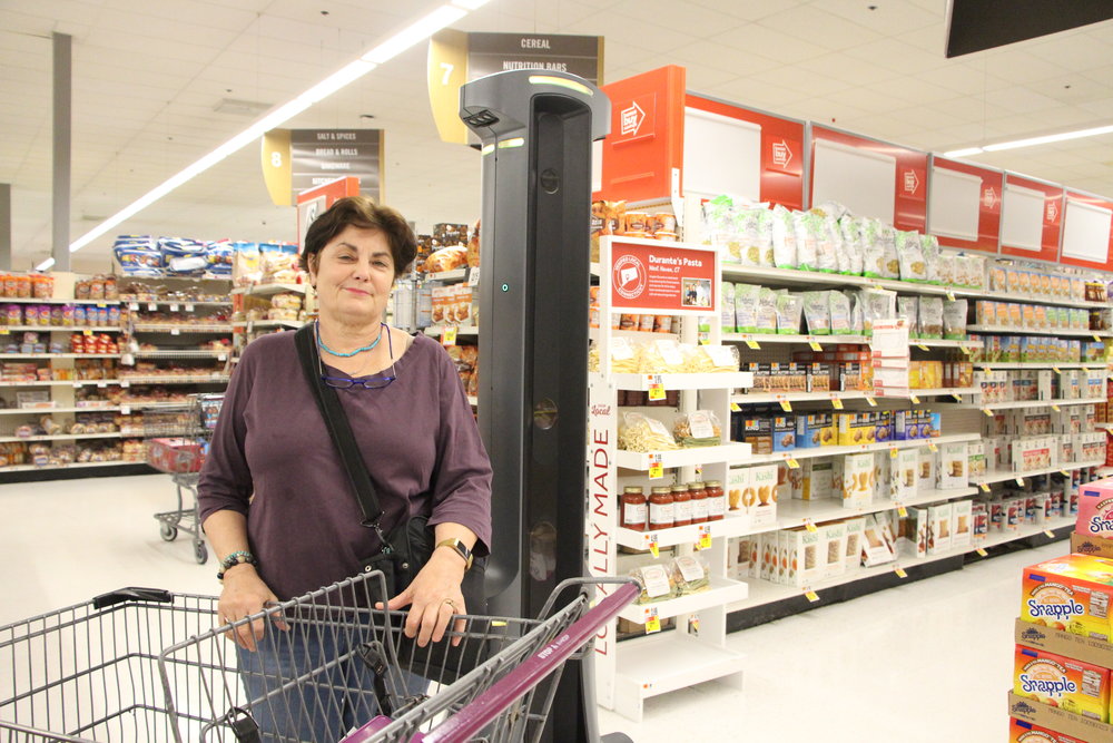 Stop &amp; Shop customer, Karen Swanson, shopping alongside Marty.