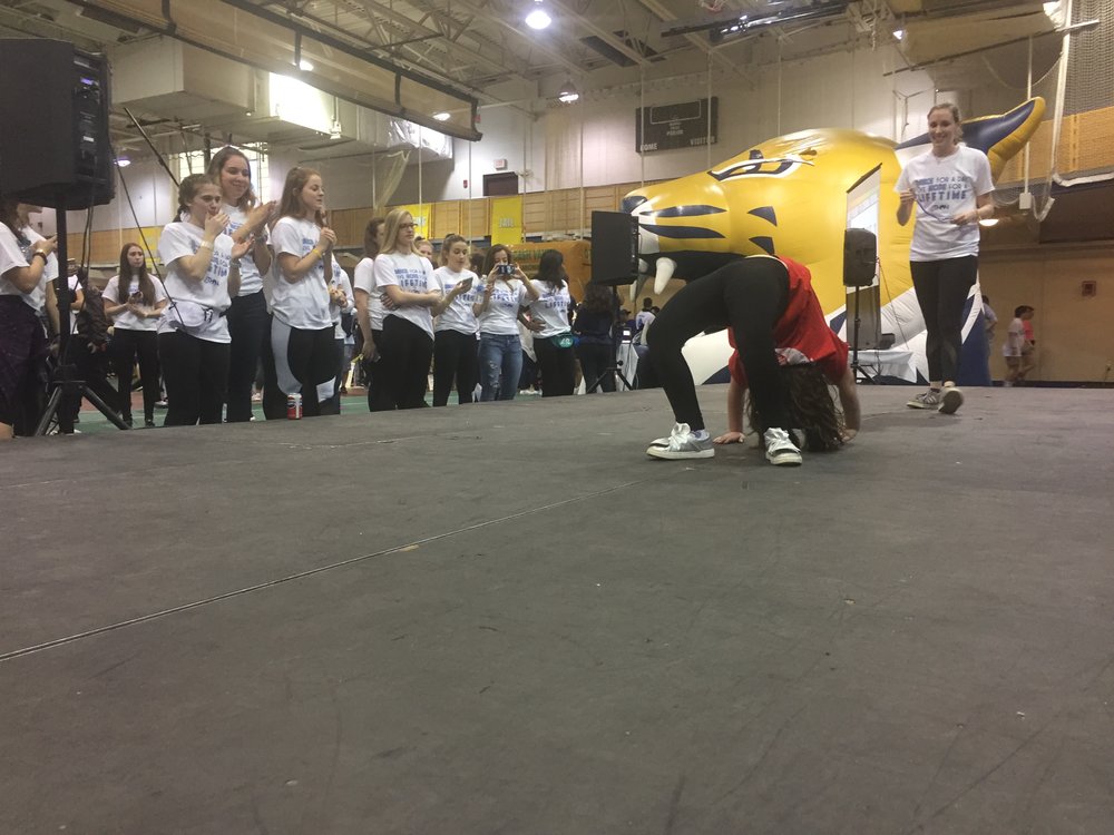 Miracle Child, Bianca, shows off her gymnastics skills at the 2018 QTHON dance marathon