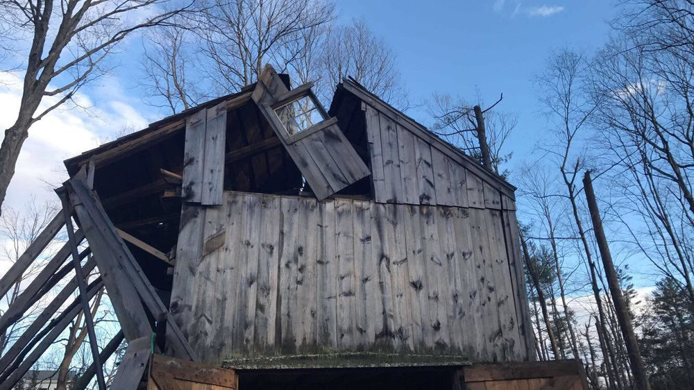 The exterior damage of the Cider Mill Barn.