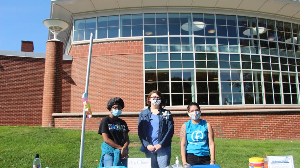 Athena Cuttle, The president of the gender and sexuality alliance, stands with other members to promote mental health with an ally chain, to reduce the stigma surrounding mental health, especially during COVID-19.
(Photo by Marianna Rappa)