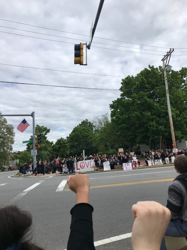 Protesters gathered in Lunenburg, Massachusetts following the death of George Floyd. There was a demand for the end of police brutality at the protests, where people from all ages and backgrounds gathered. (Photo by Riley Sanderson)