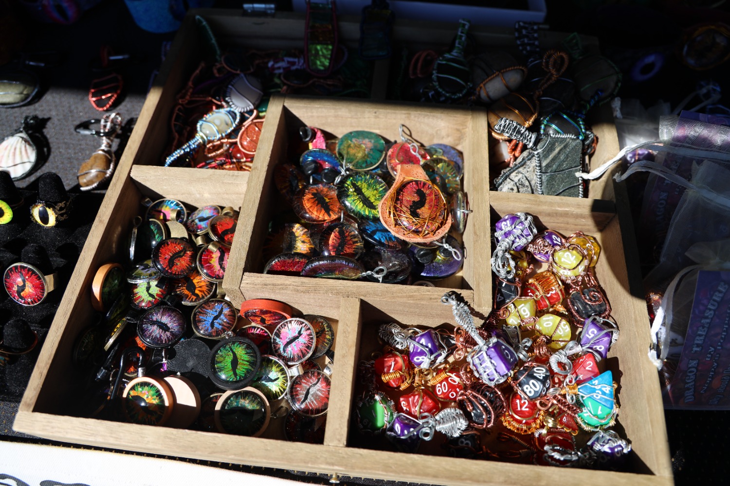 Napolitano's hand-painted pendants and accessories (Photos by Samantha Simon)