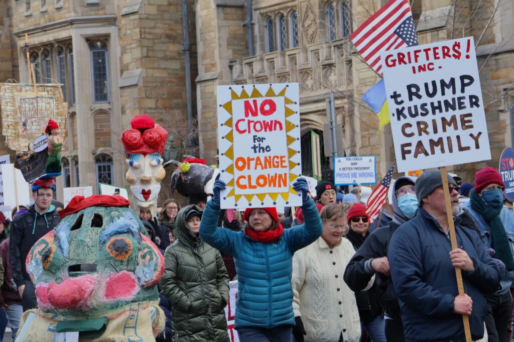 A variety of paper-mâché costumes and signs appeared during the New Haven protest. Hannah Freshman/HQNN