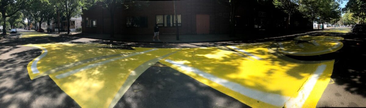 Black Lives Matter painting on Bassett Street in New Haven. The painting was created by Kwadwo Adae. (Photo by Owen Doody)