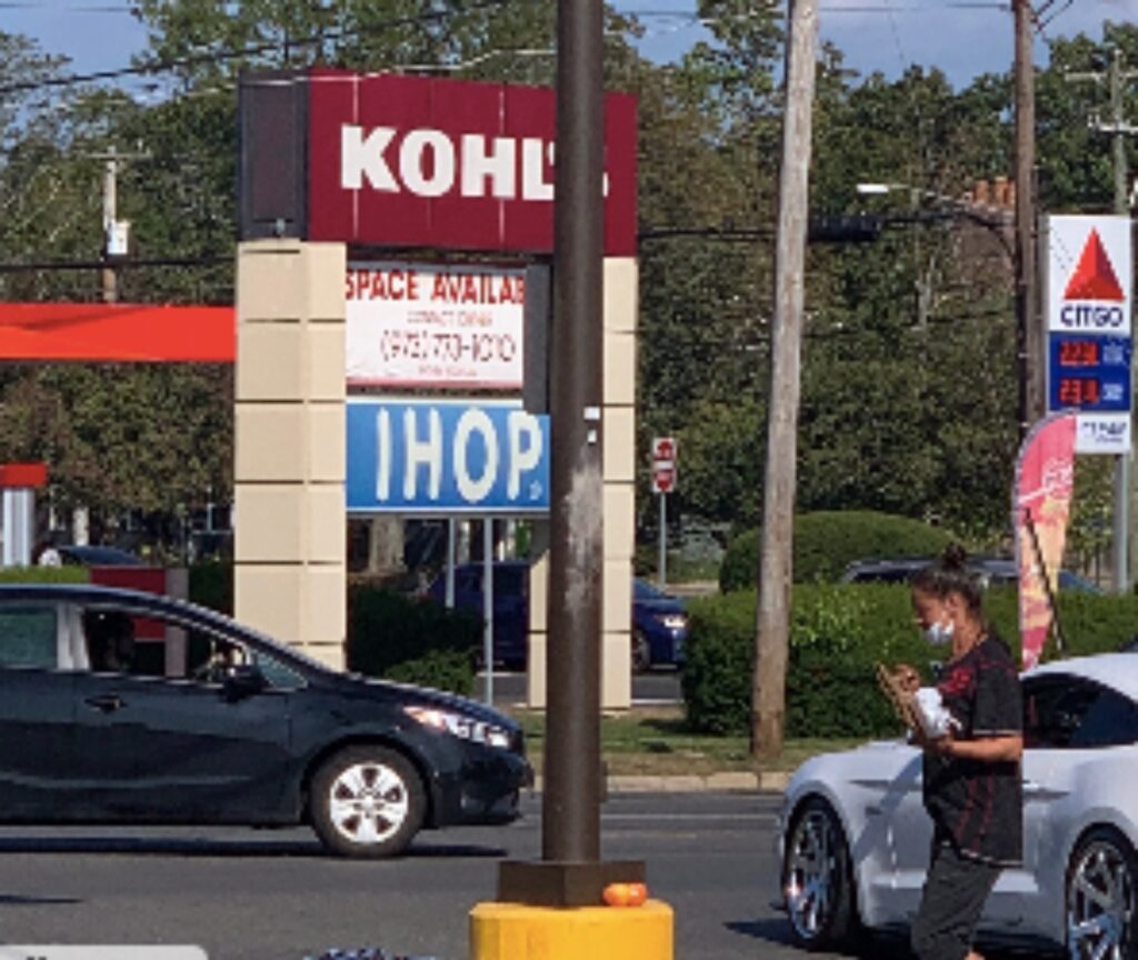 Danielle Turner walks the streets near the Hamden Plaza. (Photo by Matt Nygaard) 