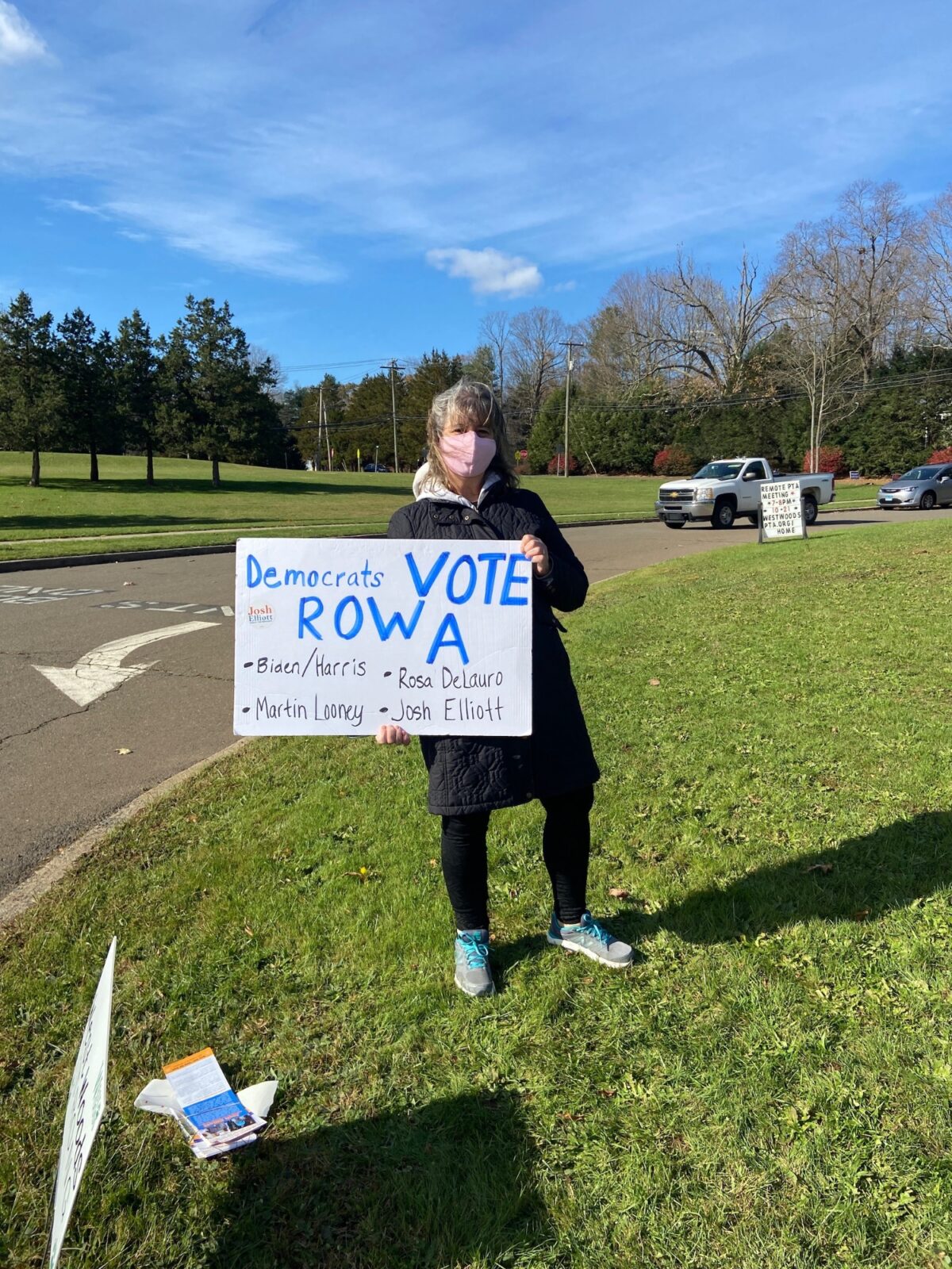 Katherine Hines, a Democratic volunteer, greets voters outside of polling locations in Hamden. (photo credit: David Rooney)