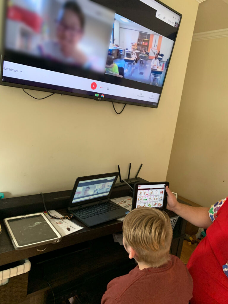 Cole Kubicza is assisted while learning remotely and virtually interacting with his classmates. (Credit: Jennifer Kubicza)