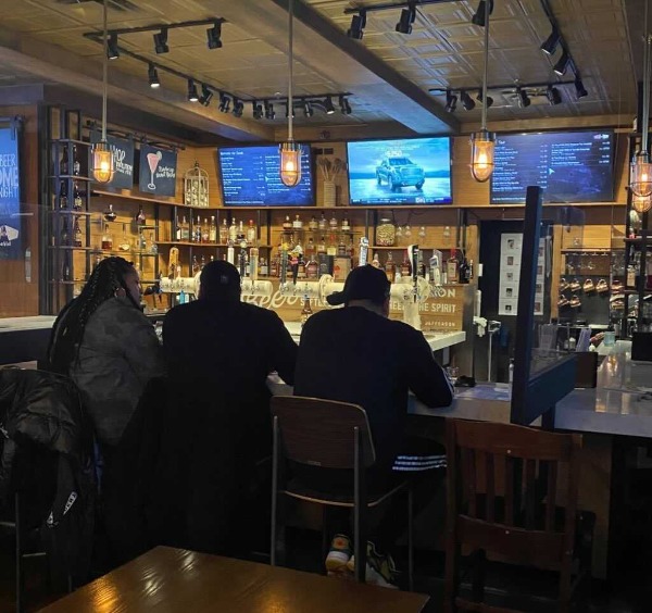 The manager at Wood-n-Tap in Hamden expects a full bar on Super Bowl Sunday.