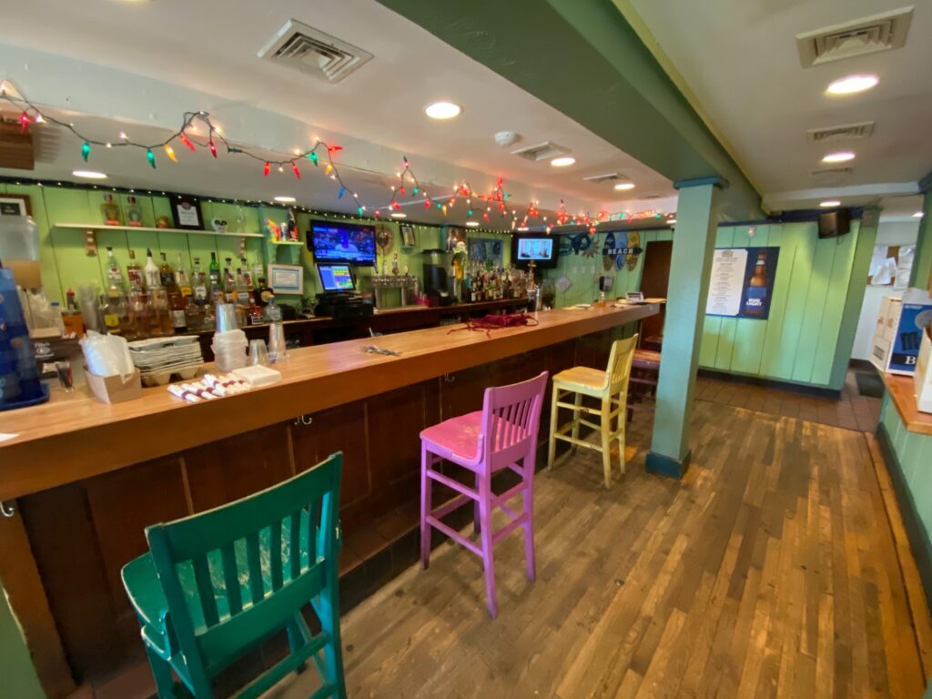 A look at Aunt Chiladas bar area where barstools are spaced six feet apart. Photo Credit: Matthew Bruin