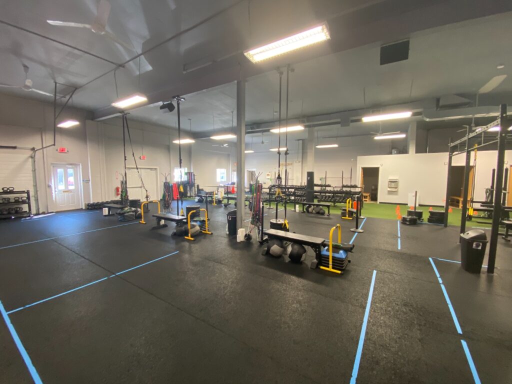 Inside the Tuff Girl Fitness Gym, 12 by 12 boxes were created to create socially distanced workout spaces for members. Photo Credit: Matthew Bruin