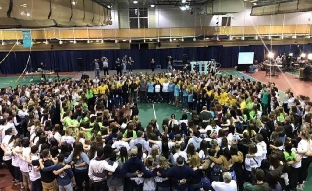 Quinnipiac students and QTHON families gather together during the annual QTHON event in 2019. Photo from QTHON Instagram. Posted, Mar. 26, 2020.