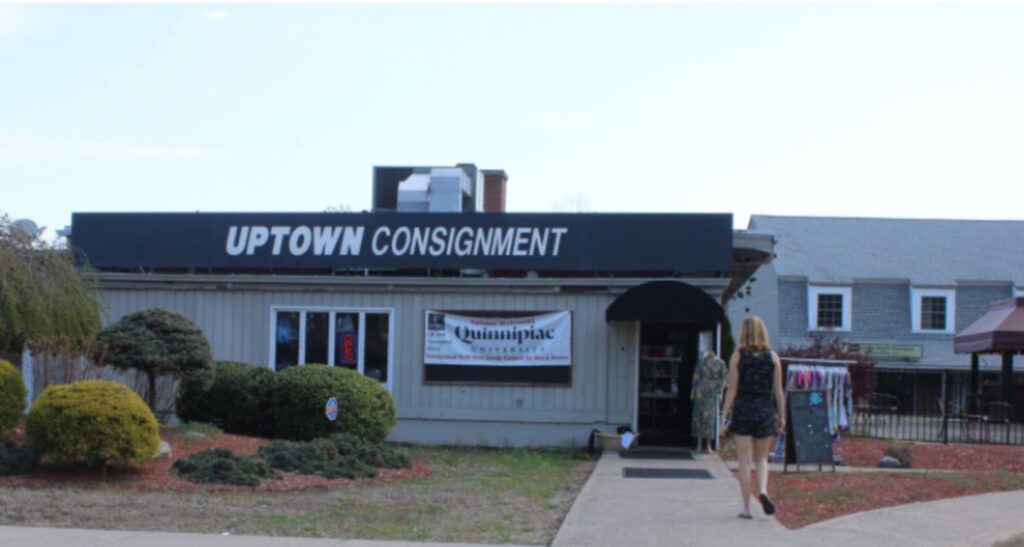 The outside of Uptown Consignment located in a big plat heading towards Cheshire and North of Quinnipiac on Whitney Avenue.