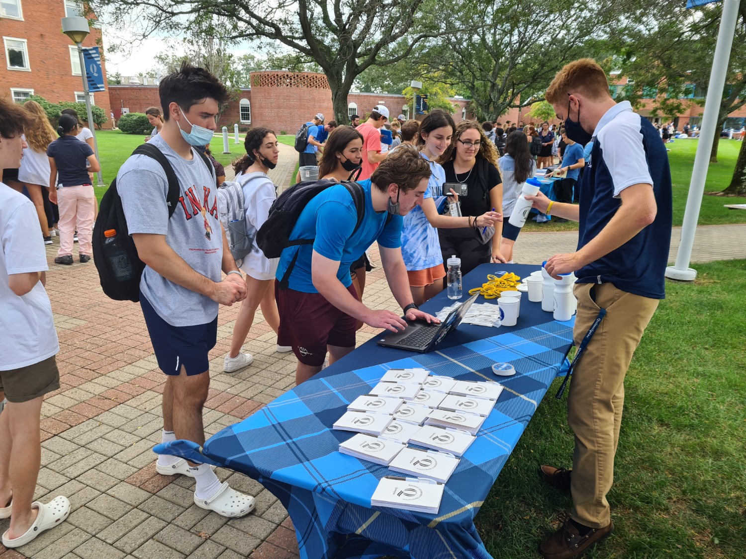 Student Government Association Vice President Chris Longchamp talks to students who are interested in getting involved at the involvement fair on Sept. 8, 2021. (Photo by Chatwan Mongkol)