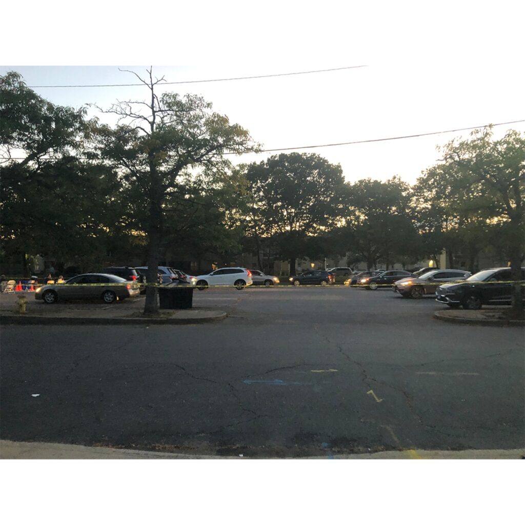  Cars beginning to fill up the whole parking lot to watch the films 