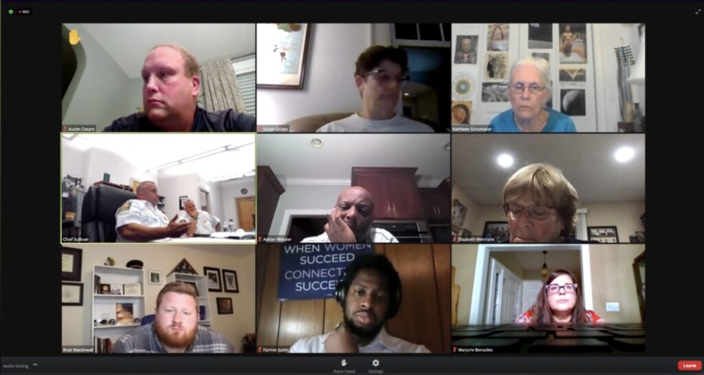 Chief of Police John Sullivan (left) and Lt. Gabriel Lupo (right) responding to questions. (Photo by Will Gavin.)