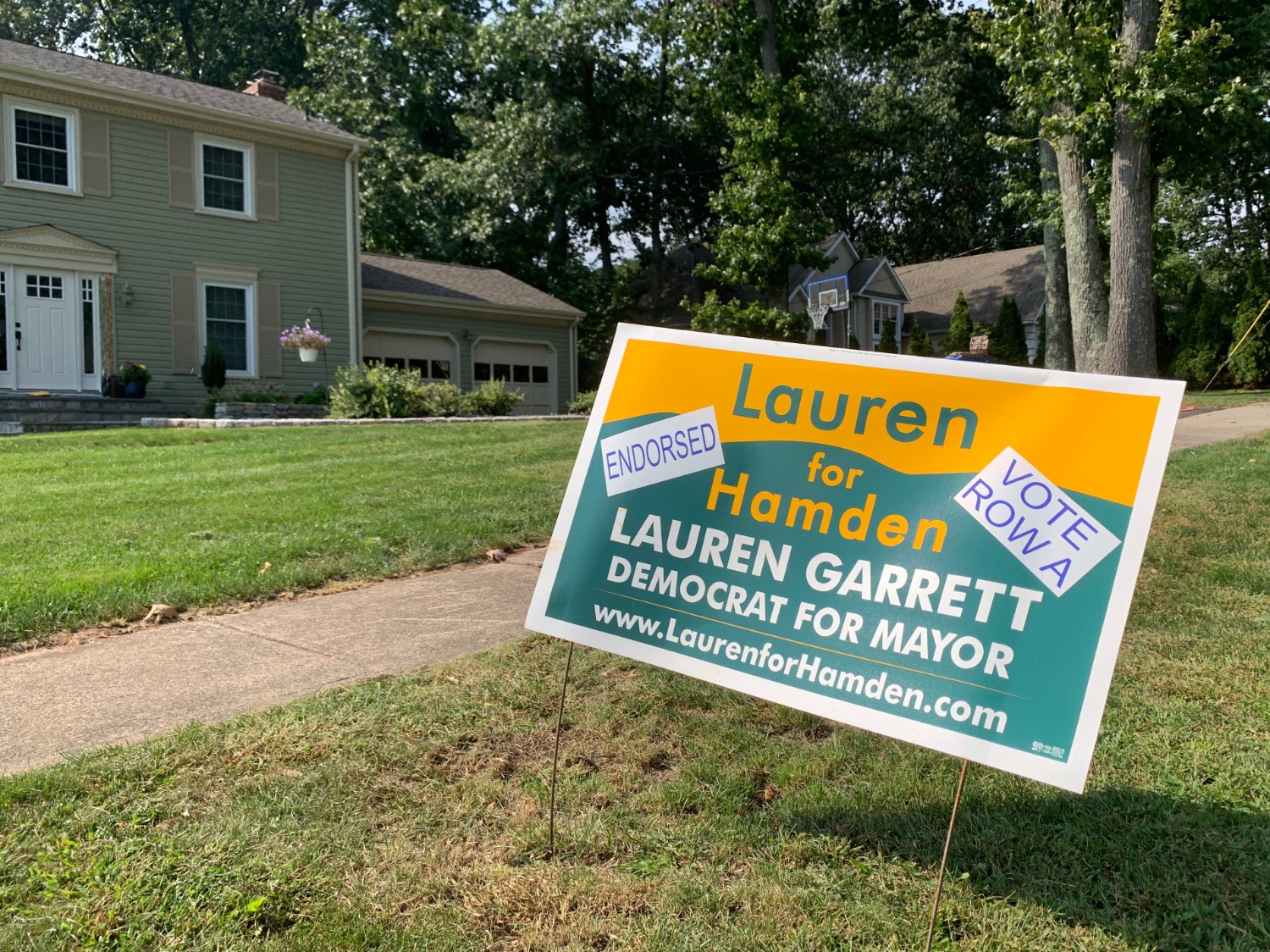 Lawn signs in support of Hamden resident's favorite candidates can be found all over the town. Lauren Garrett signs are the most commonly found. (Photo by Samantha Simon).