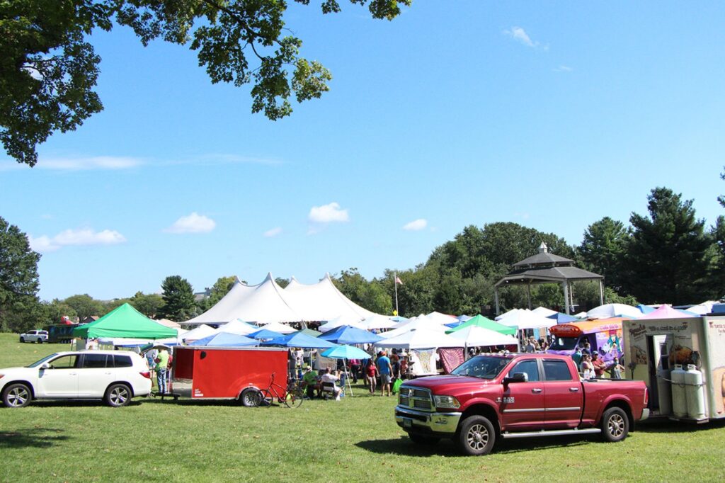 Tents begin to pop up at Town Center Park in Hamden as Hamden Fest opens up Saturday morning. Photo by Dalton Rice