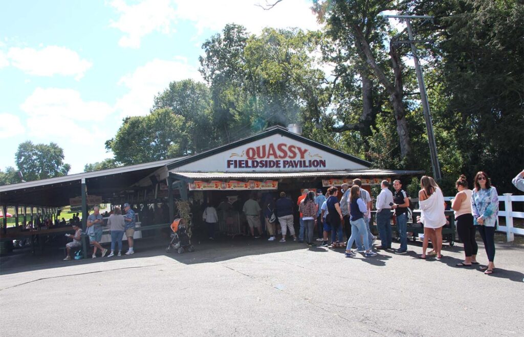 A line of people are heading into the pavilion to eat, drink and party. Photo by Will Knox
