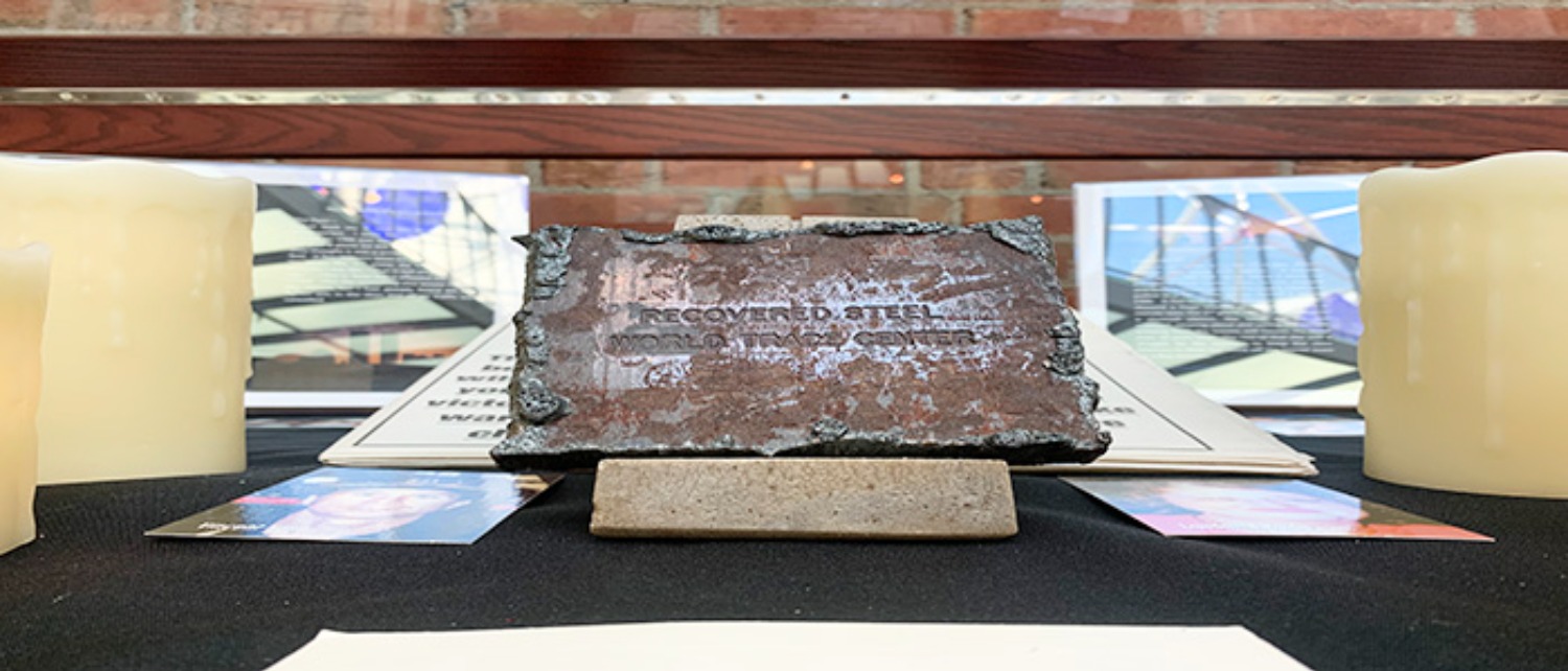 Gifted to the University by Bryan Hunt, this small 4x4 piece of recovered steel sits as the centerpiece of the exhibit. (Photo by Andrew Marchitto)