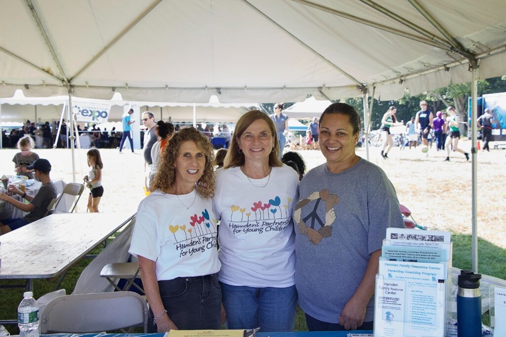 Hamden's Partnership for Young Children employees made their way to the Hamden Fest to talk to families about what they offer for Hamden Residents (Tricia Godfrey, middle) Photo by Dalton Rice