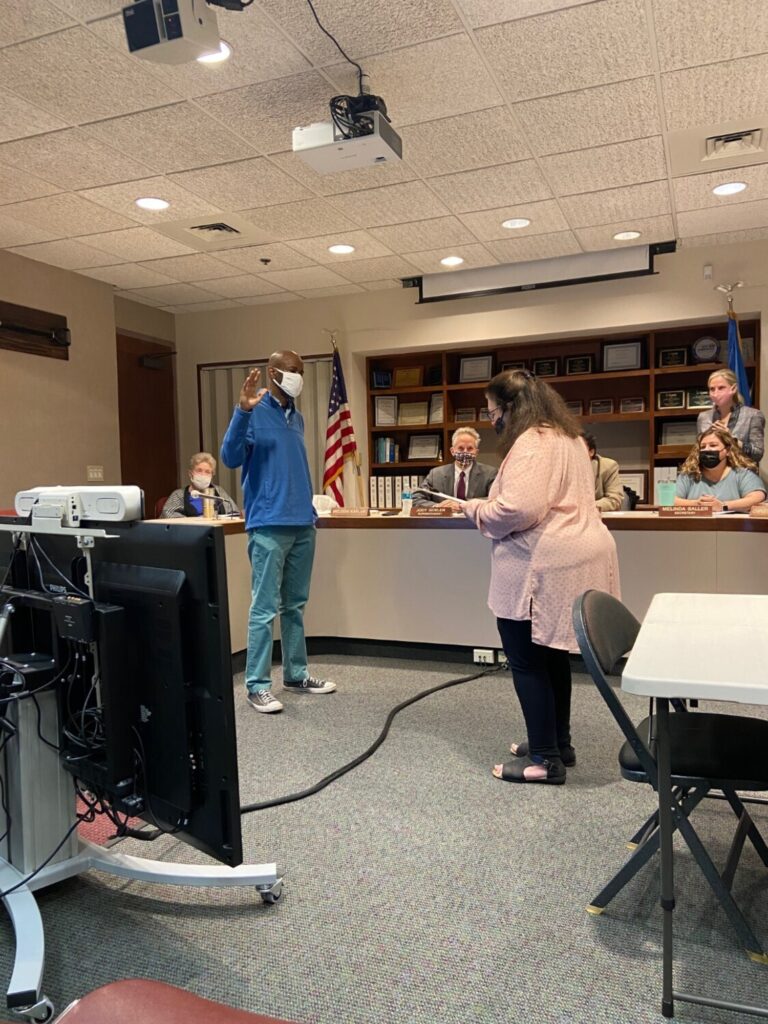 David Asbery gets sworn in to the Hamden Board of Education. Photo by Ryan Coope
