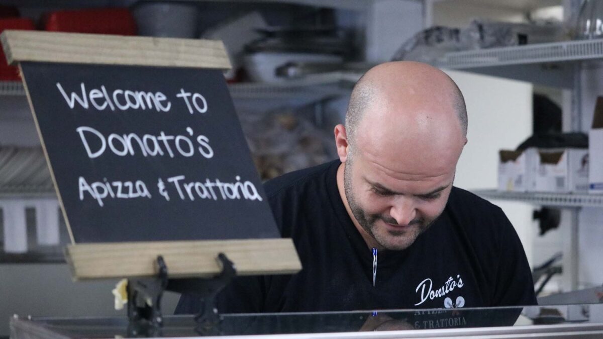 Donato's Pizza owner Vincenzo Buontempo said he hopes to see new faces come in during the weekend. (Photo by Xavier Cullen)