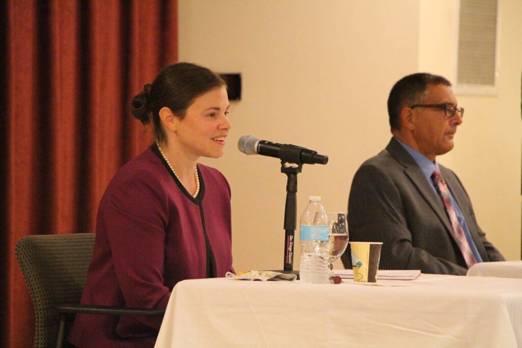 Both Hamden Mayoral candidates, Lauren Garrett and Ron Gambardella, answer questions Thursday morning at their debate. (Photo by Chatwan Mongkol)