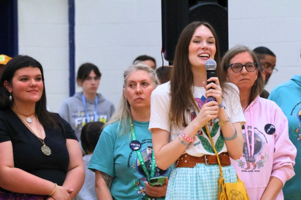 Quinnipiac alumni Kiara Tanta-Quidgeon (right), founder of the Indigenous Student Union (ISU), alongside her cousin and former ISU president Aiyanna Baker (far left). Both have served as the driving force behind the Powwow Planning Committee, moving the university's relationship with its namesake from symbolic to substantive. Hannah Freshman/HQNN